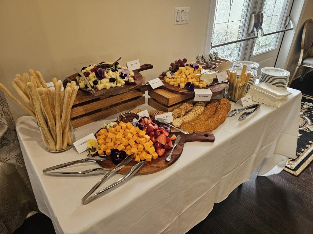 Catered charcuterie and appetizer buffet spread