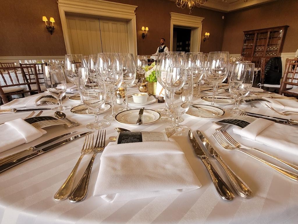 Formal dining table with elegant place settings