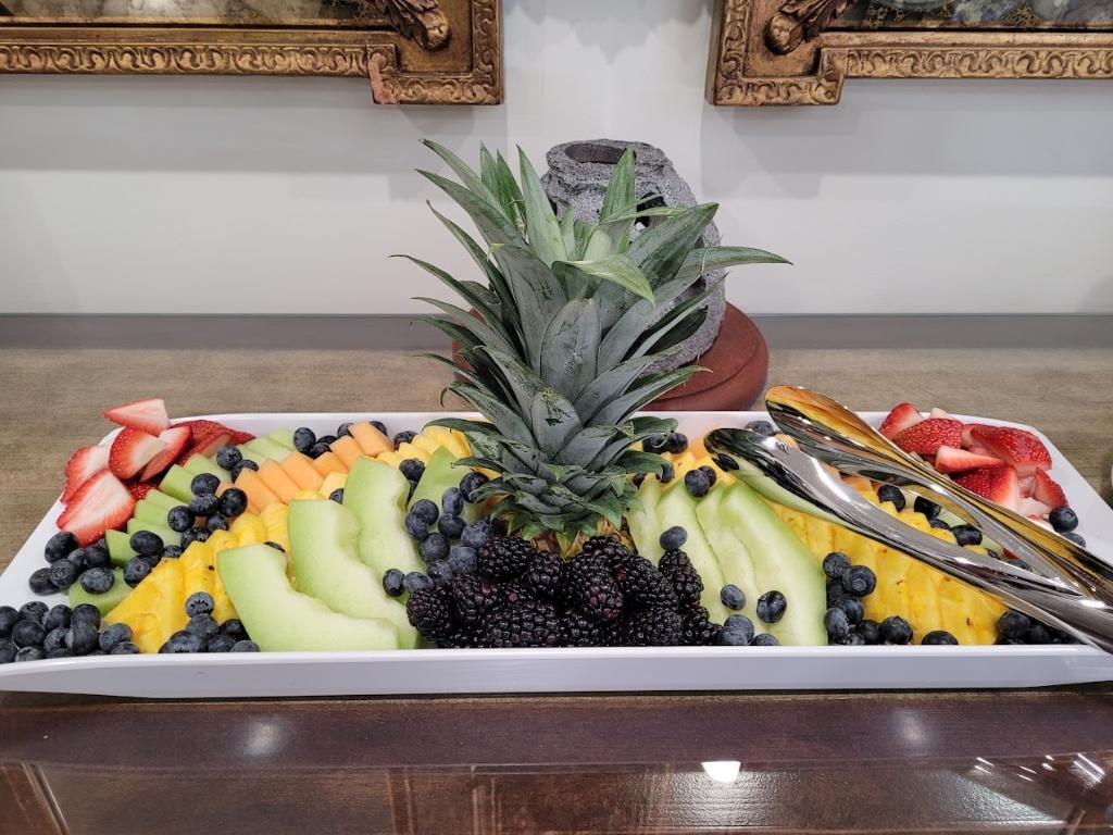 Colorful fruit platter with fresh pineapple