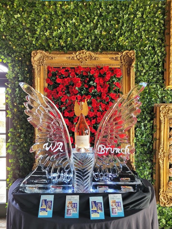Elegant brunch display with ice wings and roses