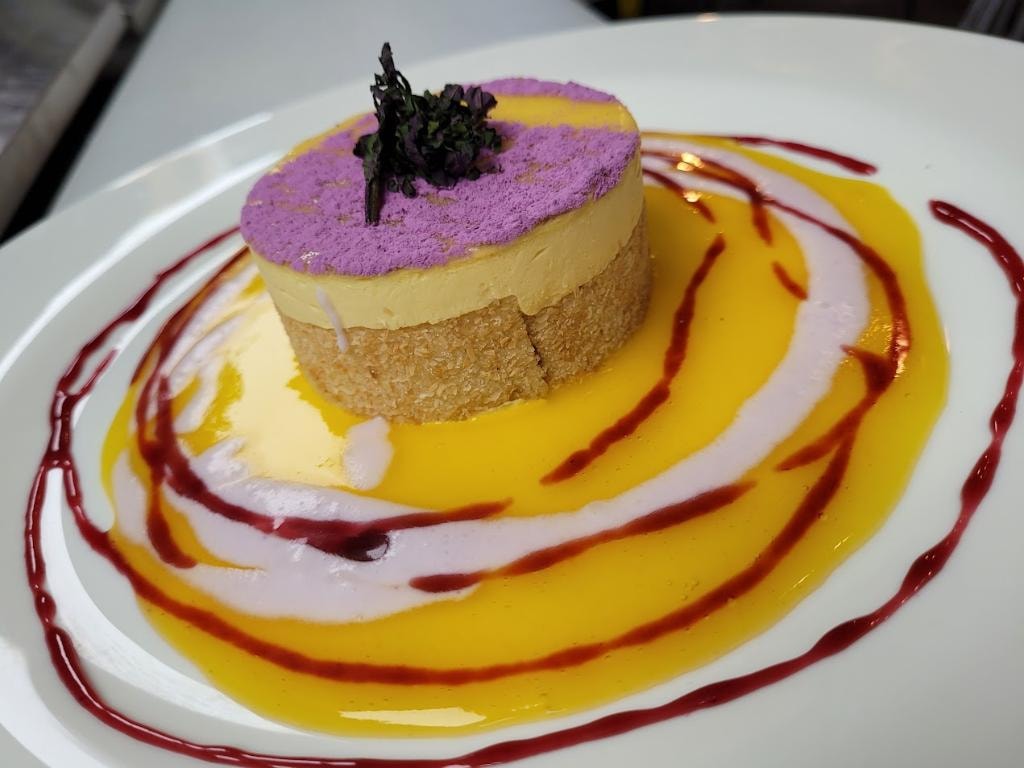 Gourmet layered cake with purple mousse