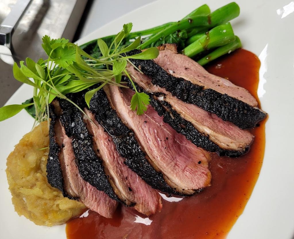 Seared duck breast with asparagus puree