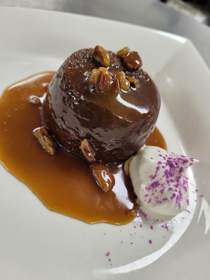 Chocolate mousse with caramel sauce and ice cream