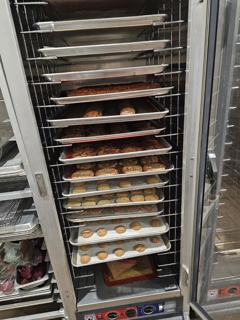 Commercial bakery rack filled with freshly baked goods