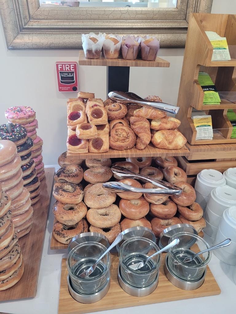 Breakfast pastry and bagel buffet with assorted donuts