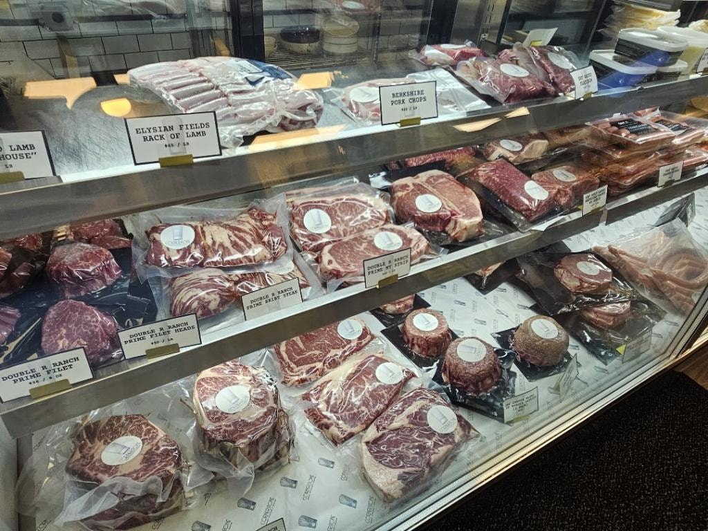 Cornerstone butcher case with premium cuts of meat