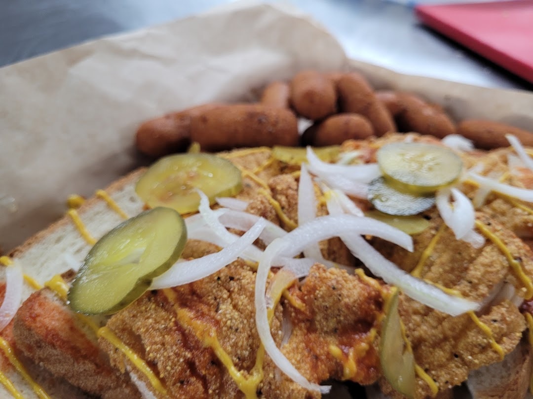 Sandwich with pickles and onions