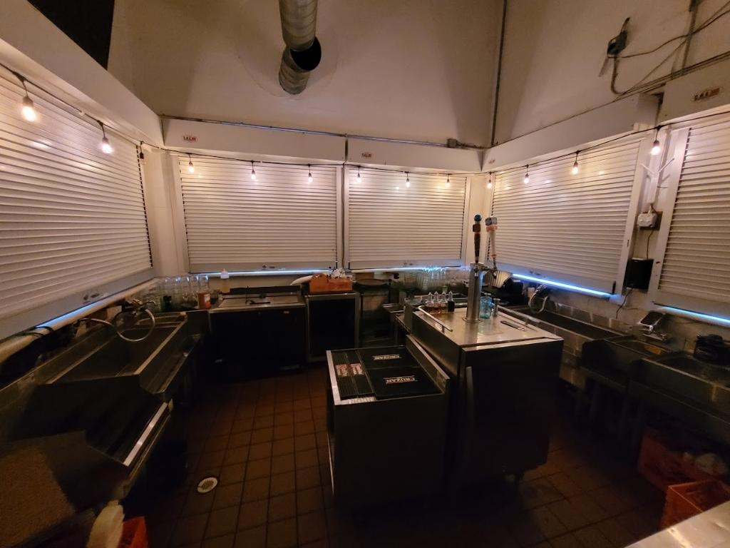 Oceanport Marina bar service area with roller shutters