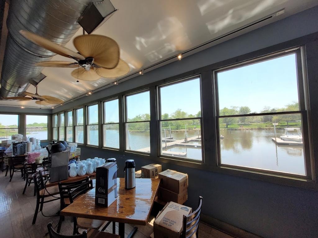 Oceanport Marina interior dining room with marina water views