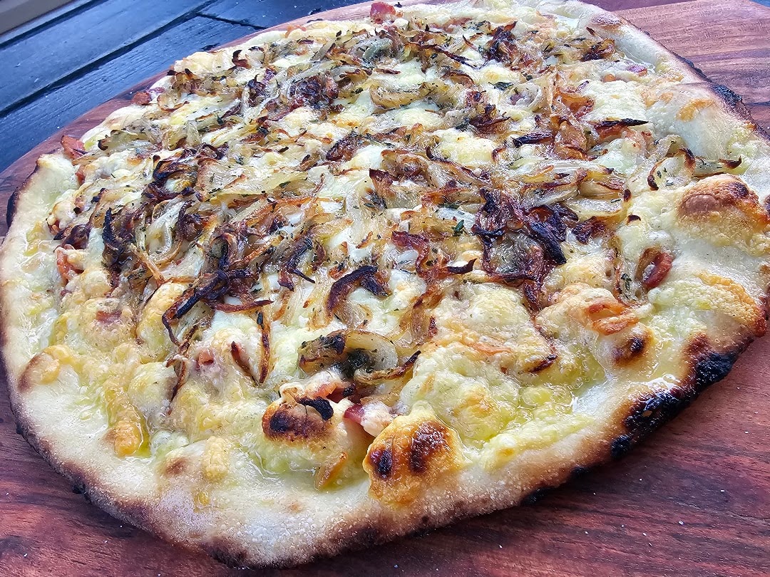 Caramelized onion and bacon pizza