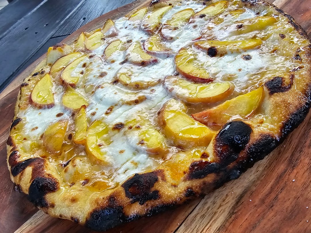 Potato cheese pizza with charred crust